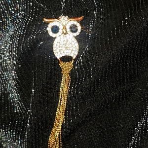 Owl brooch with blue eyes